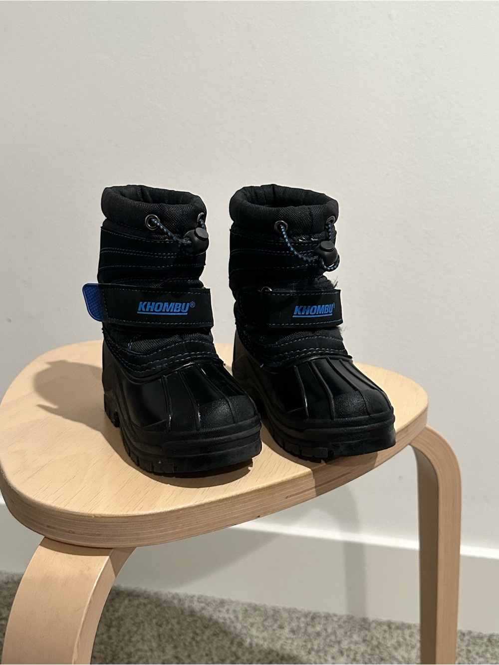 Khombu Kids Black Snow Boots with Blue Logo Accent